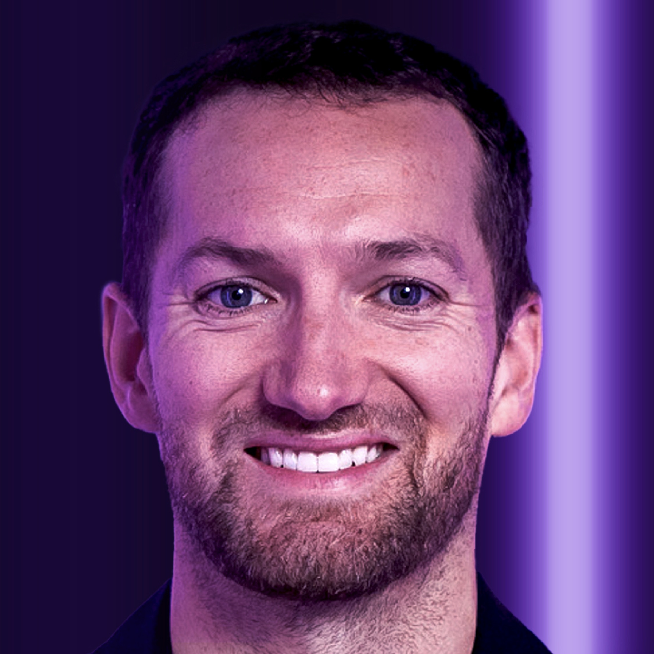 A close-up portrait of Virgin Galactic astronaut Colin Bennett