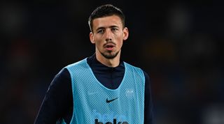 Barcelona defender Clement Lenglet, warming up in a bib