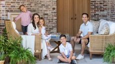 Designer Marie Flanigan and her family on the patio of their home
