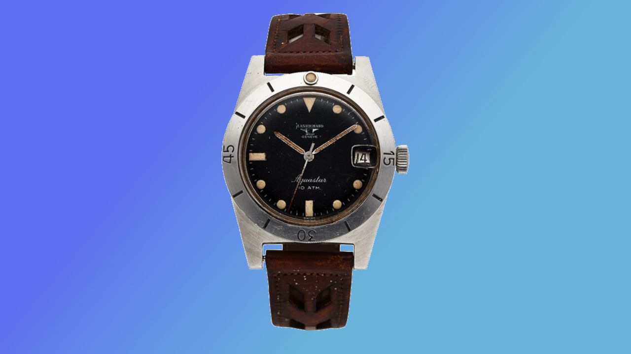 Captain Don Walsh&#039;s JeanRichard Aquastar 60 dive watch on a blue background