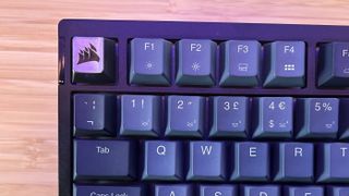 Close up on escape key and keycaps of Corsair K65 Plus Wireless keyboard