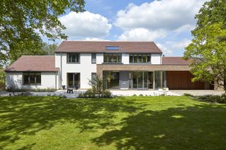 house rendering has been used on the original house, with stylish brick for the extension