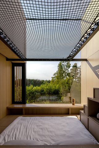 inside looking out from Estonian treehouse Piil by architecture studio Arsenit
