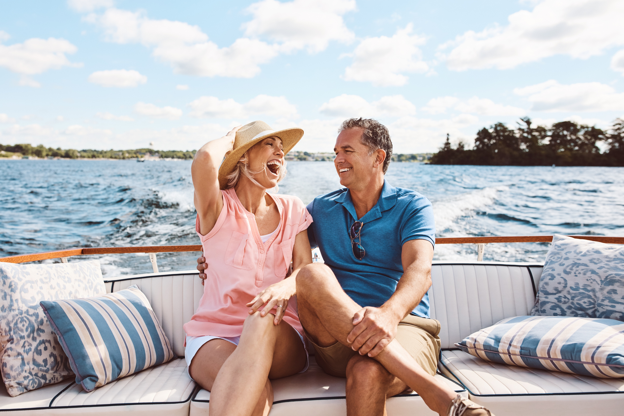 Happy older couple on a boat