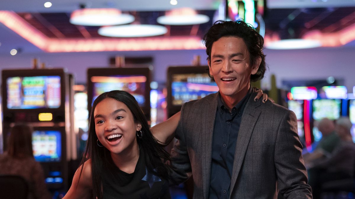 Mia Isaac (as Wally) and John Cho (as Max) at a casino in Don&#039;t Make Me Go