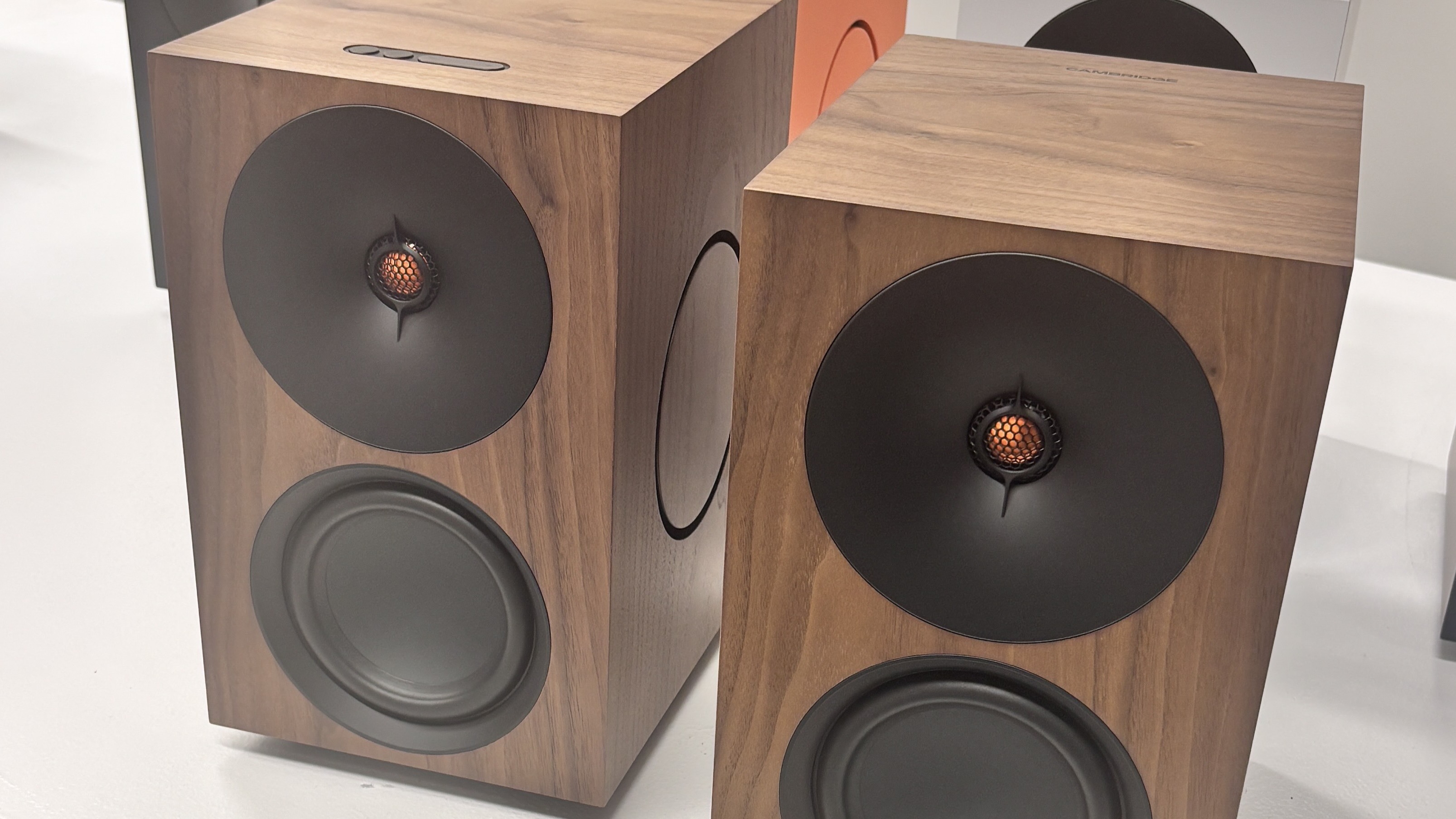 Cambridge Audio L/R X powered speakers in a brown wood finish