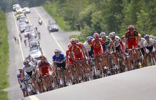 The peloton climbing one of the few average-size mountains during stage two.