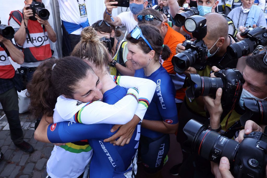 Gold medallist Italys Elisa Balsamo L wearing her World champions rainbow jersey celebrates with teammates after winning the womens elite cycling road race 1577km from Antwerp to Leuven on the seventh day of the Flanders 2021 UCI Road World Championships on September 25 2021 in Leuven Photo by Kenzo Tribouillard AFP Photo by KENZO TRIBOUILLARDAFP via Getty Images