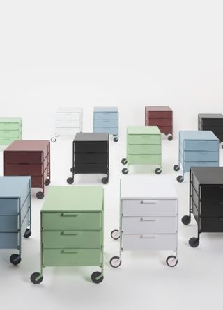 The ‘Mobil’ storage unit by Antonio Citterio, now recreated in recycled plastic. Square Chests of drawers on wheels with three drawers on each in various colours.