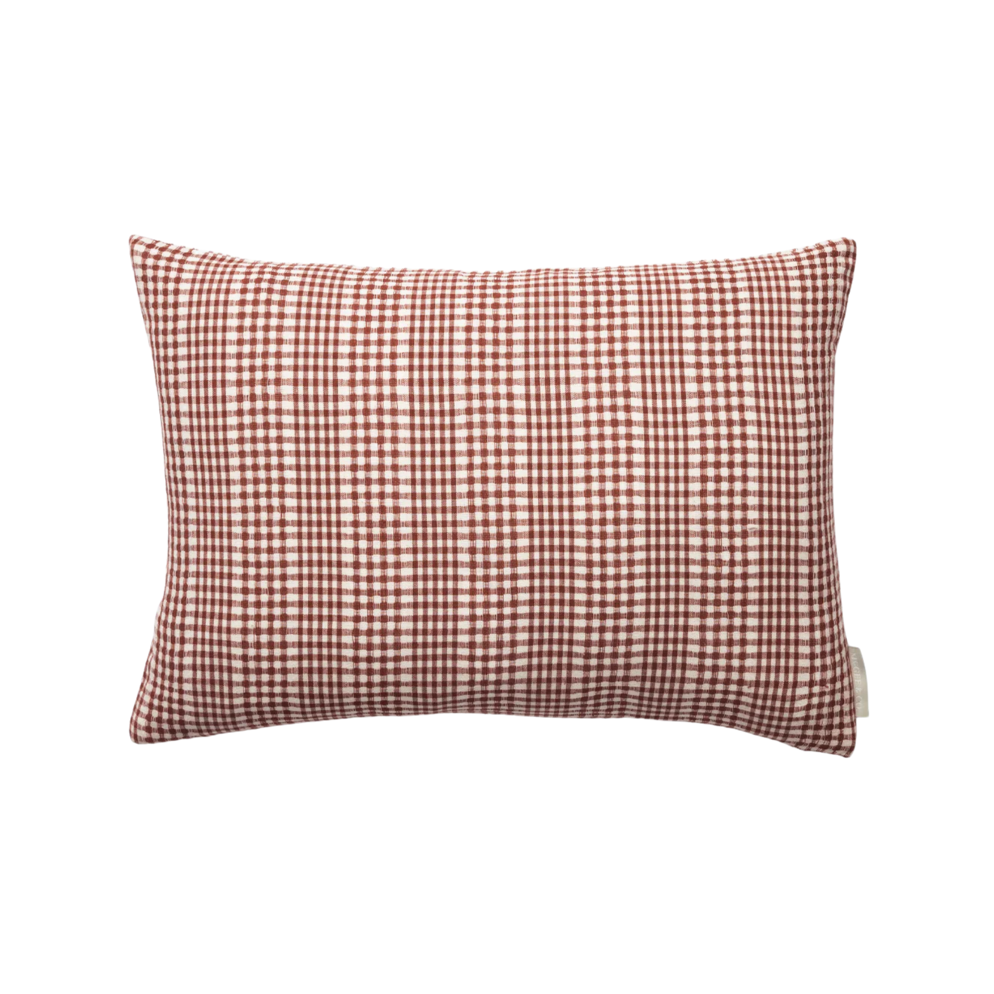 a pillow with red and white gingham print