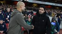 Pep Guardiola and Mikel Arteta shake hands at the Emirates Stadium.