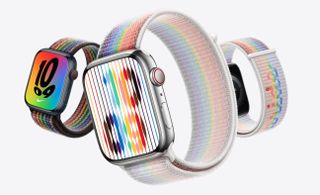 Three apple watches and Pride bands