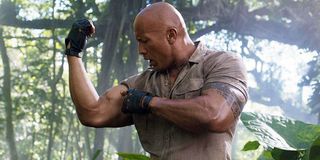 Dwayne Johnson flexing in Jumanji 2019