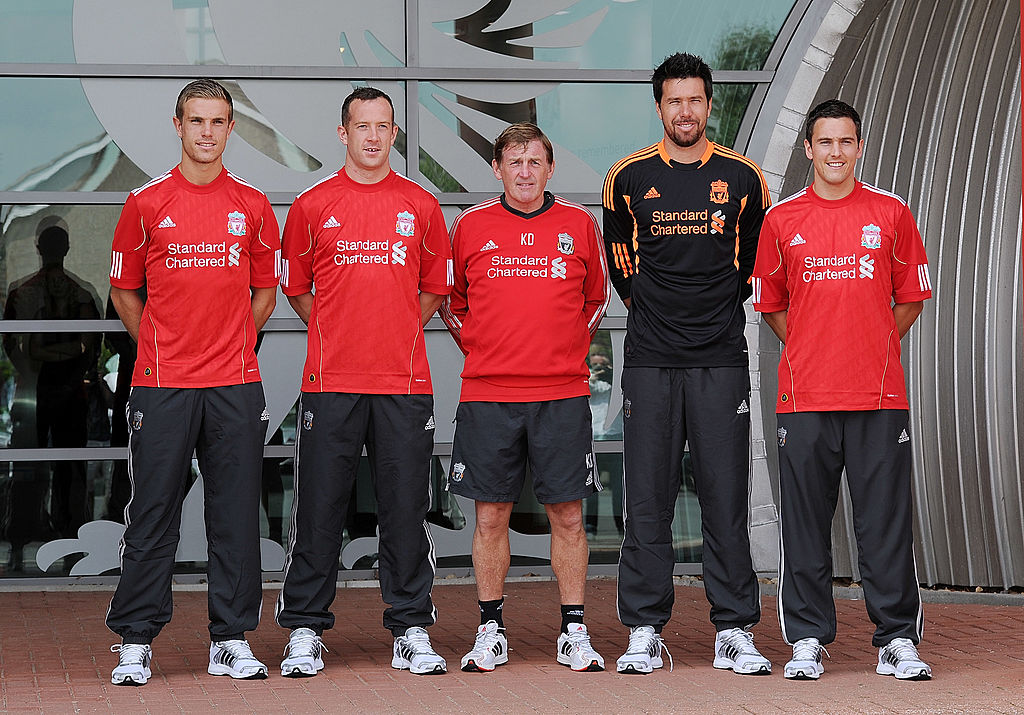 LIVERPOOL, ENGLAND - AUGUST 03: (THE SUN OUT) Manager Kenny Dalglish (C) presents new signings (L-R) Jordan Henderson, Charlie Adam, Alexander Doni and Stewart Downing of Liverpool following a press conference at Melwood Training Ground on August 3, 2011 in Liverpool, England. (Photo by Andrew Powell/Liverpool FC via Getty Images)