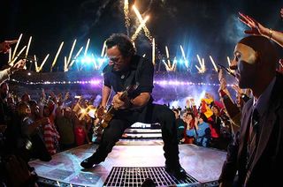 Bruce Springsteen and the E Street Band perform at the halftime show during Super Bowl XLIII