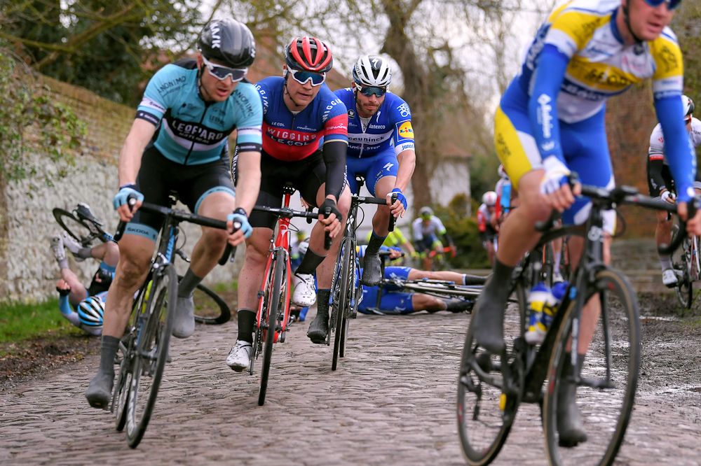 August Jensen (Israel Cycling Academy) and Davide Martinelli (Deceuninck-QuickStep) on the deck after crashing in Le Samyn