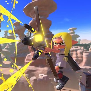 A character from Splatoon 3 using a weapon to shoot ink