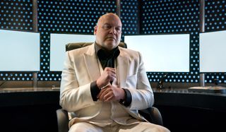 Wilson Fisk sitting at a chair