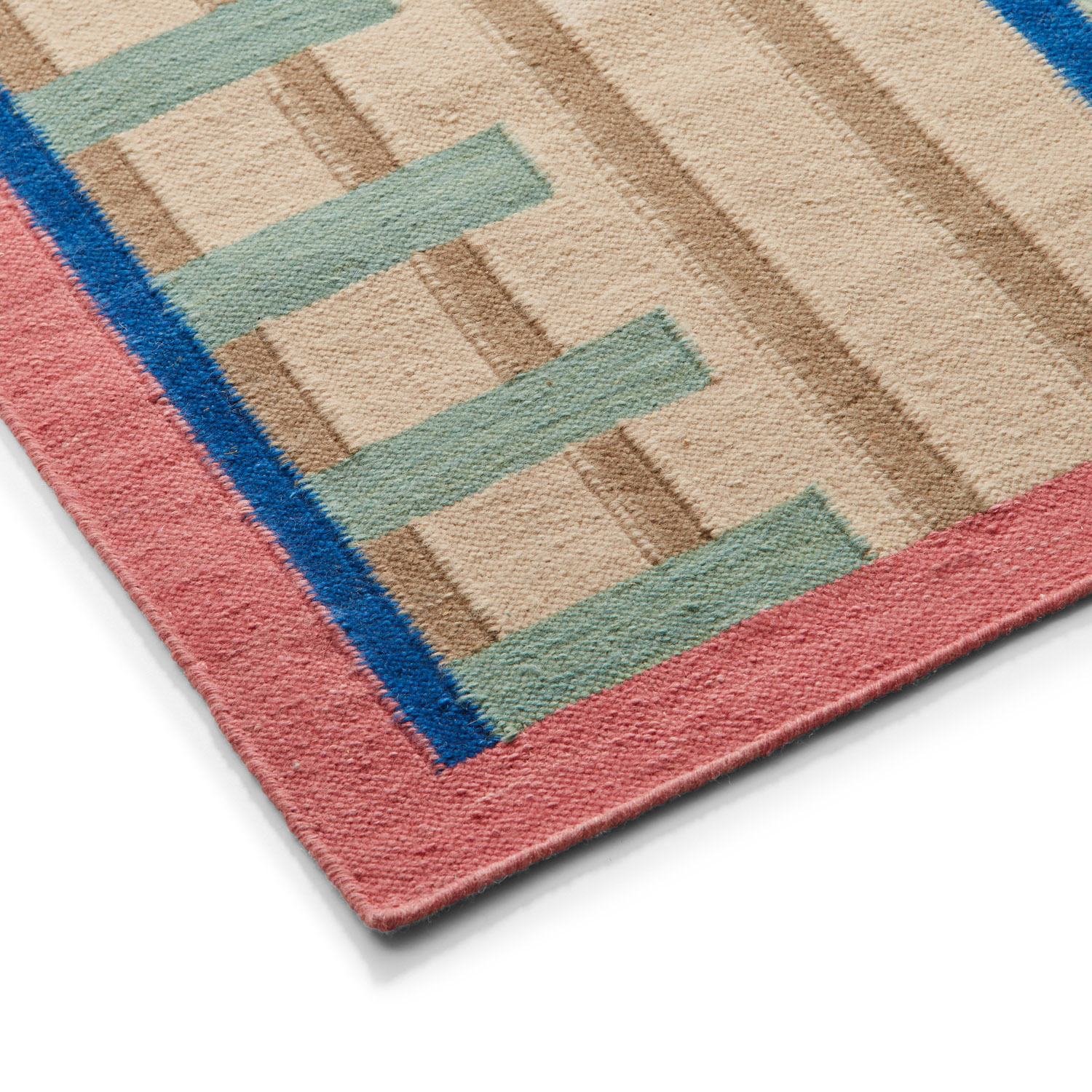 colourful geometric rug design by POoR Collective