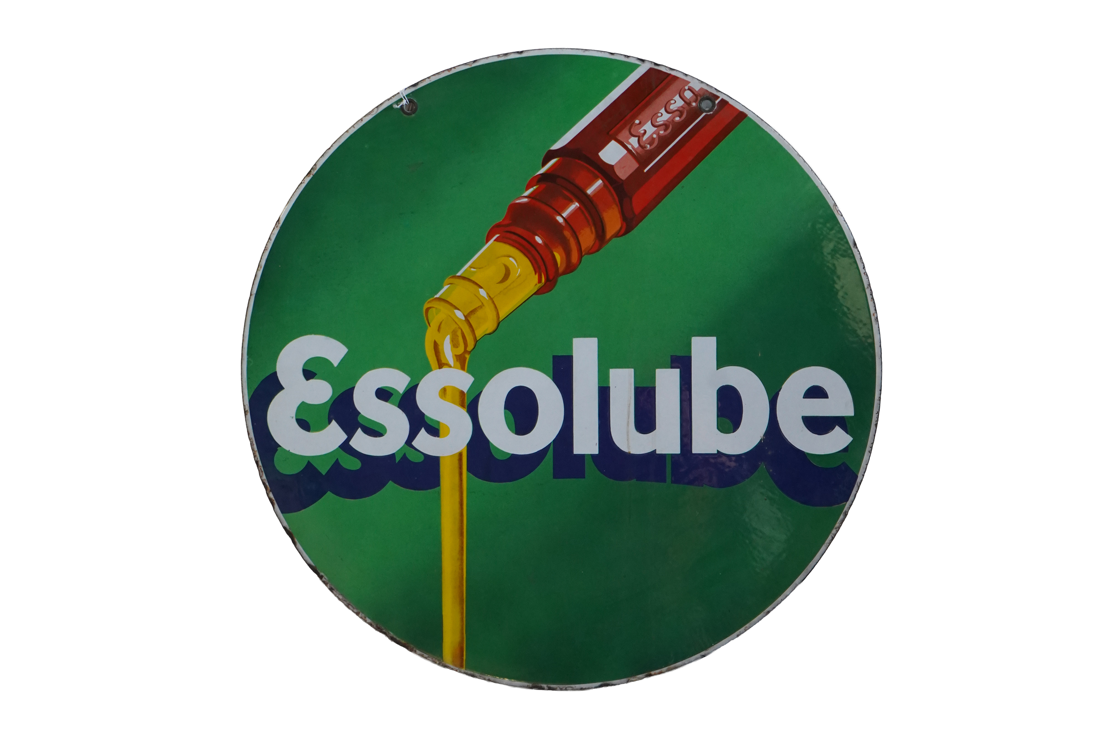 A green sign saying essolube