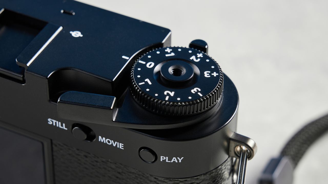 A black Fujifilm X half camera