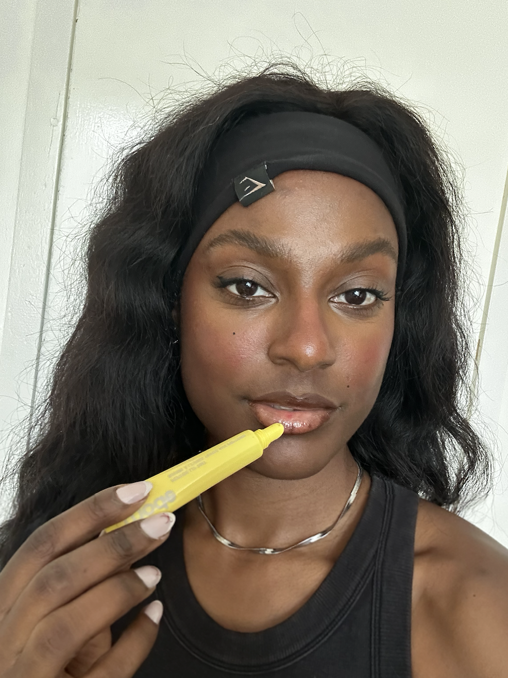 Shei wearing rhode lemontini lip tint