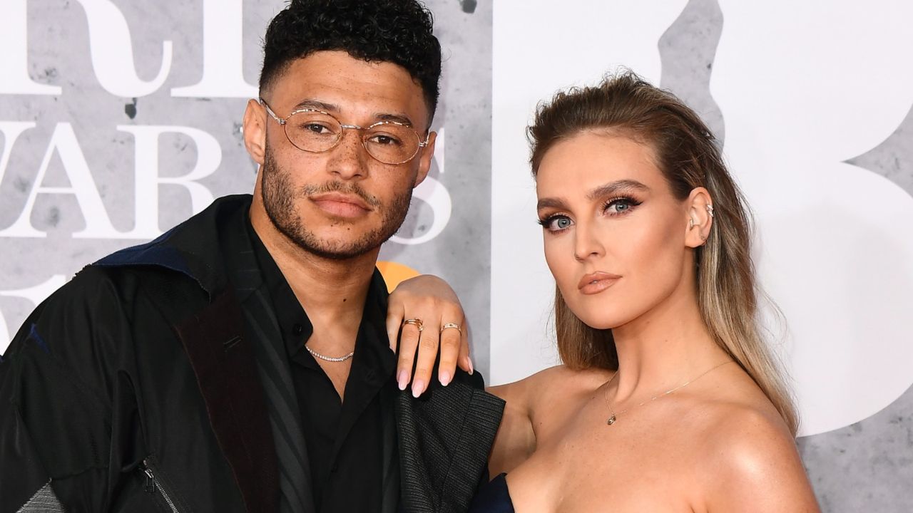 Alex Oxlade-Chamberlain and Perrie Edwards attend The BRIT Awards 2019 held at The O2 Arena on February 20, 2019 in London, England.