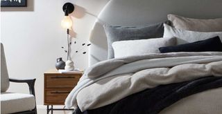 Cosy bedroom with teddy fleece bedding to support the cocconcore interior design trend