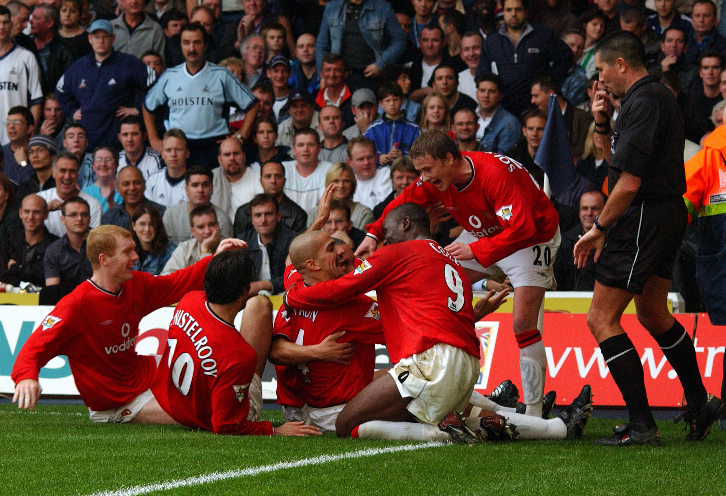 Juan Sebastian Veron celebrates with his Manchester United team-mates after scoring his side's fourth goal in a 5-3 win at Tottenham in September 2001.