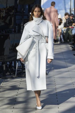 Woman in funnel neck coat