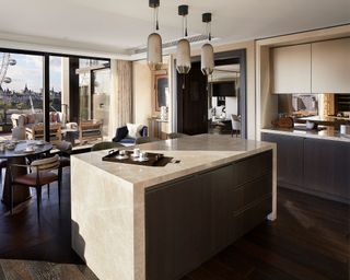 Modern kitchen with marble surface and wood floor