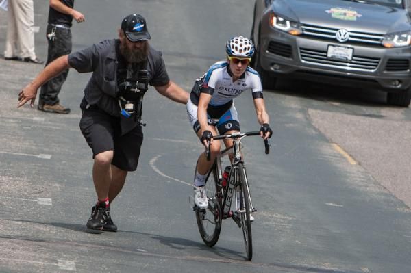 Kristin McGrath (Exergy) gets a push after having a mechanical.