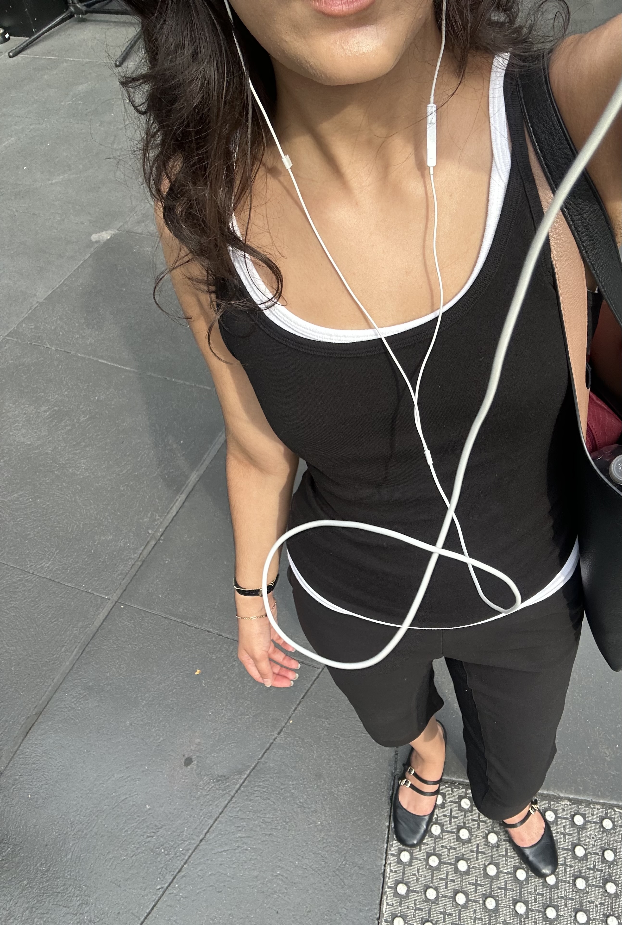WWW editor Josephine Hadjiloucas wears wears black capris with a double layer of tank tops and ballet flats.