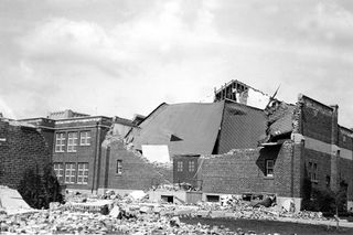 Long Beach, Calif., Earthquake March 10, 1933. Compton Junior High School, Compton, Ca. View showing extensive damage to the rear of the main school building.