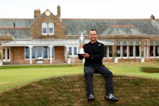 Xander Schauffele lifts Claret Jug