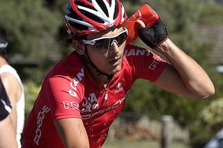 Mobile shower: Drapac Porsche's Angus Morton cools himself down on the road during hot conditions in the men's under 23 road race.