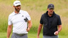 Dustin Johnson and Phil Mickelson during the first round of the LIV Golf Invitational Series tournament at London's Centurion Club