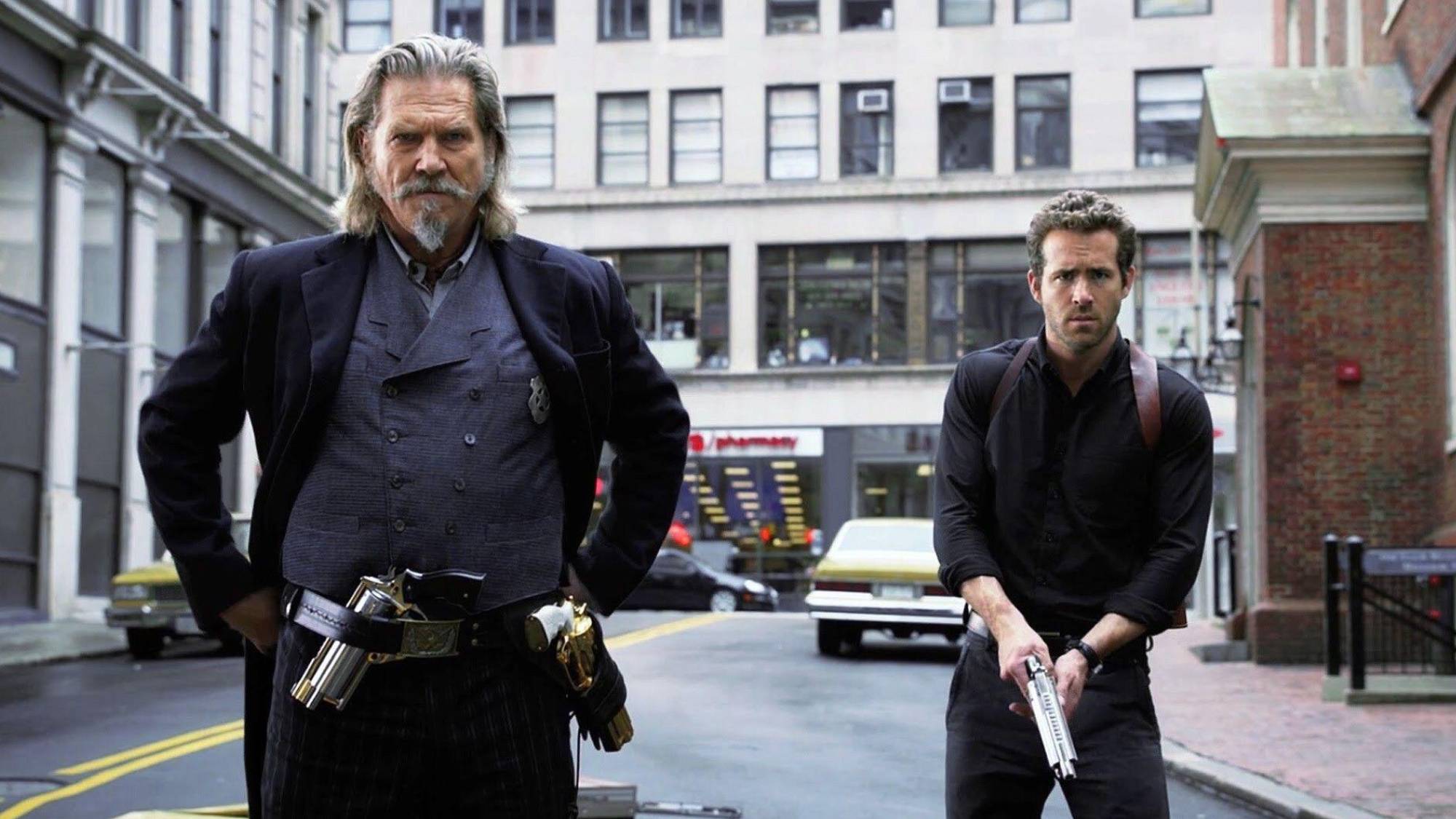 (L-R) Jeff Bridges as Roicephus "Roy" Pulsipher and Ryan Reynolds as Nick Walker in "R.I.P.D."