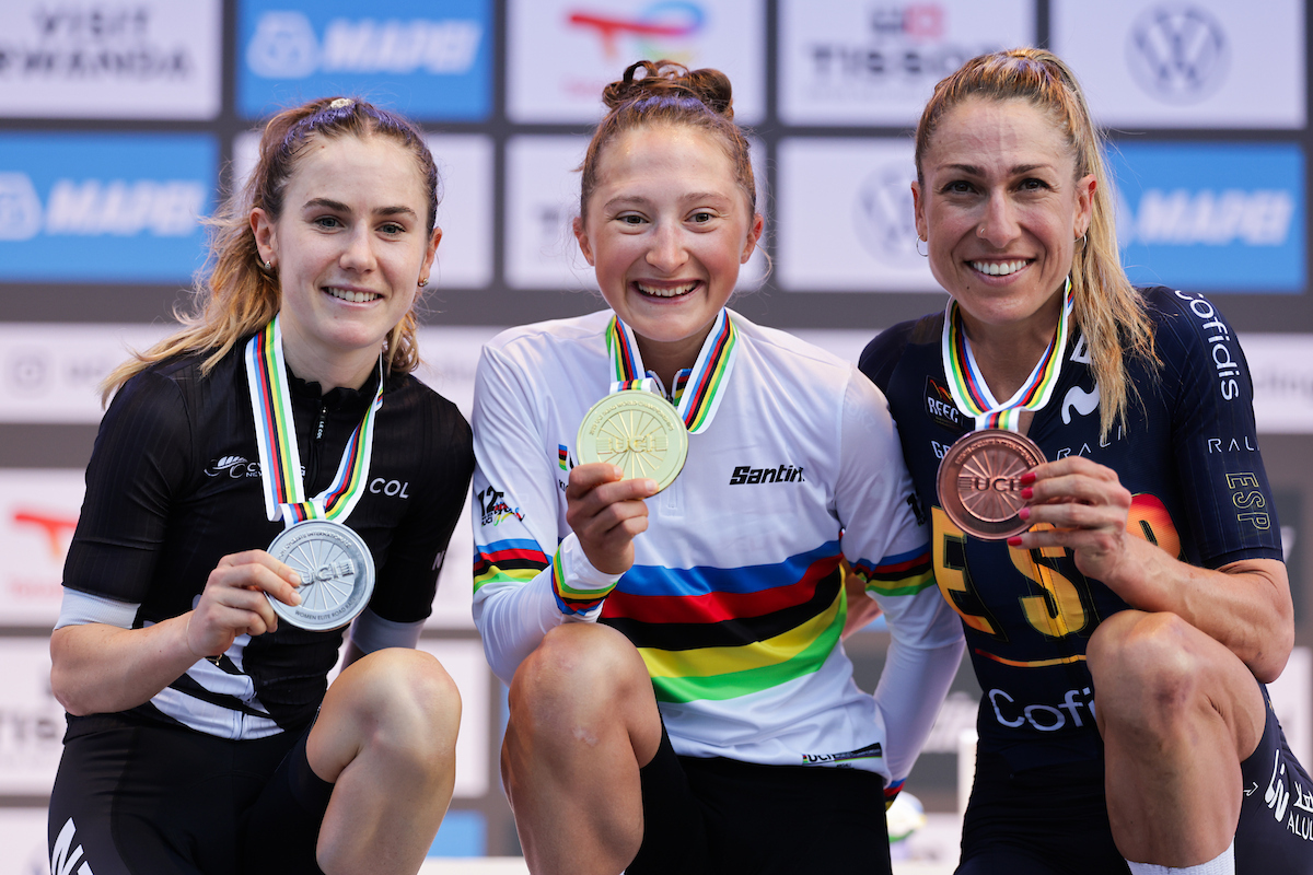 Picture by Alex Whitehead/SWpix.com - 27/09/2025 - Cycling - 2025 UCI Road World Championships - Kigali Convention Centre, Kigali, Rwanda - Women Elite Road Race Podium - Magdeleine Vallieres (Canada) receiving the Gold Medal to become World Champion with Niamh Fisher-Black (New Zealand) receiving the Silver Medal and Mavi Garc&amp;iacute;a (Spain) receiving the Bronze Medal