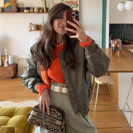 @juliesfi taking a selfie with a shag haircut and bangs