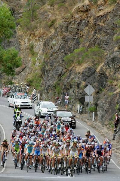 The peleton head out of the outer suburbs of Adelaide and into the hills.