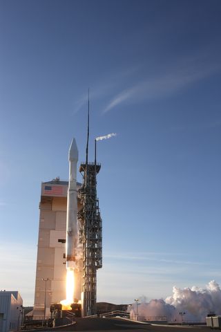 A United Launch Alliance Atlas 5 rocket carrying the Air Force's DMSP-19 military weather satellite lifts off from Space Launch Complex-3 at Vandenberg Air Force Base, Calif., on April 3, 2014.