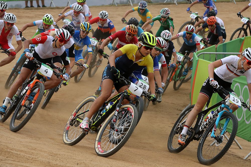 The women's field gets underway for the cross country race.