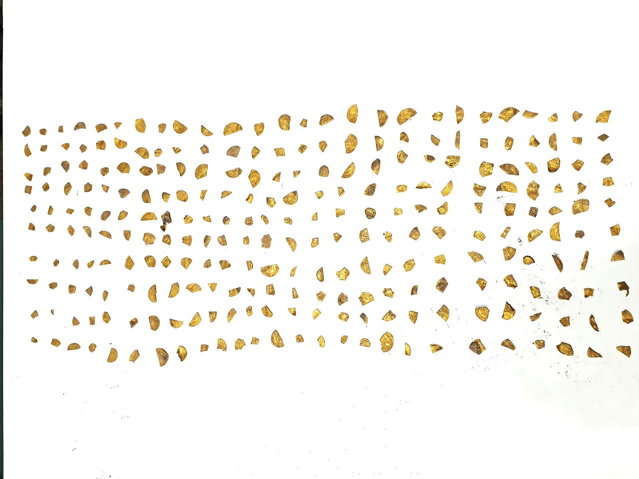 The pieces of gold dinar that were cut to be used as "small change".