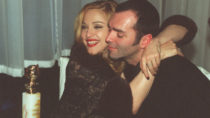 Madonna, winner of Golden Globe for Best Actress in Motion Picture Musical or Comedy with her brother Christopher Ciccone at the Disney party following awards ceremony