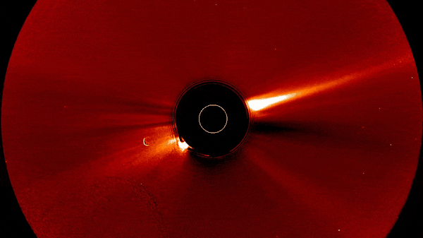a bright mass errupts from a red circle.