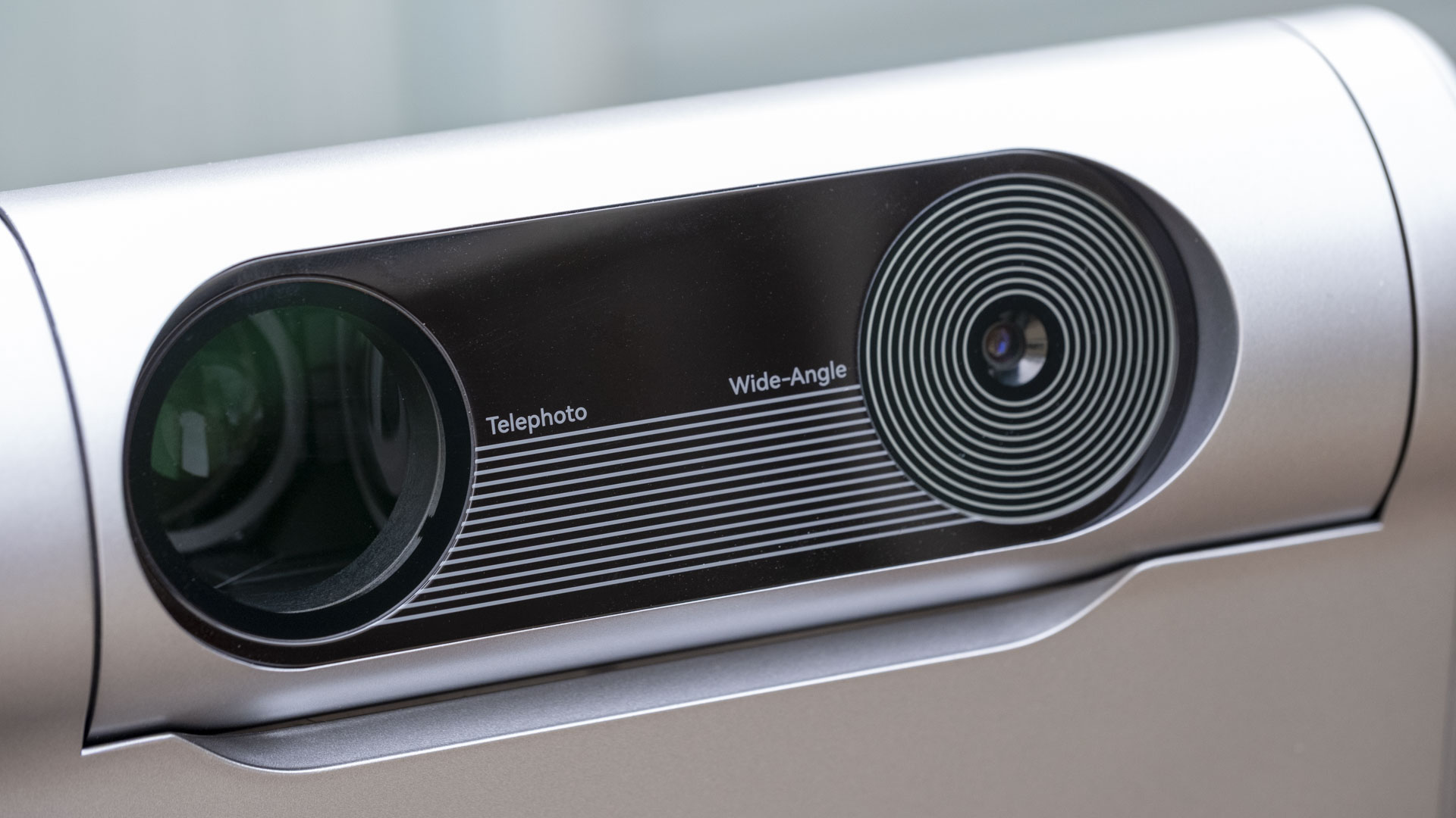 The Dwarf III smart telescope showing a close-up of the two lenses at the front of the device