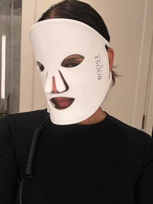 Neha P., a 'Marie Claire' tester, tests The Light Salon Boost Advanced LED Light Therapy Face Mask