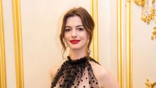 Anne Hathaway wearing bold lipstick