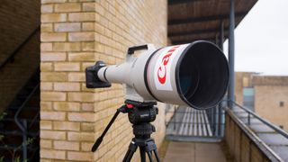 The Canon EF 1200mm f/5.6L USM lens on a balcony